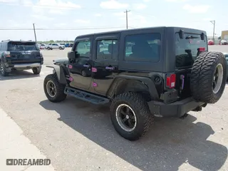 2013 Jeep Wrangler Unlimited Sport with VIN 1C4BJWDG9DL569109, listed as a IAAI auction lot 42115703 with 120,803 mi miles. Bid and sale history available at carsss.com. Image 3.