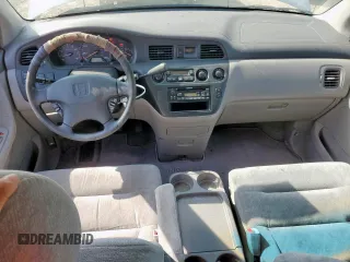 2001 Honda Odyssey EX z VIN 2HKRL18641H619203, wystawiony jako Copart lot #59329555 z przebiegiem 180 058 mil mil oraz Czysty tytuł • Clean title. Historia ofert i sprzedaży dostępna na DreamBid. Obrazek 8.