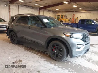 2023 Ford Explorer ST z VIN 1FM5K8GC5PGC26305, wystawiony jako IAAI lot #42166101 z przebiegiem 27 064 mil mil oraz . Historia ofert i sprzedaży dostępna na DreamBid. Obrazek 1.