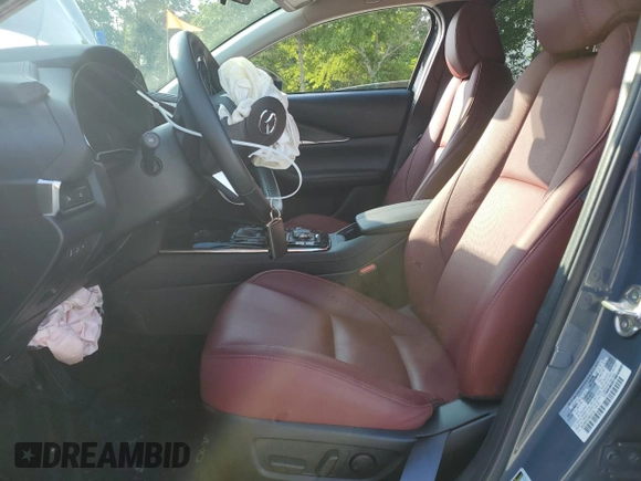 2024 Mazda CX-30 S Carbon Edition с VIN 3MVDMBCMXRM604194, выставлен на аукционе Copart как лот 54777125 с пробегом 9 816 миль миль и Списание • Salvage title. История ставок и продаж доступна на DreamBid. Изображение 7.