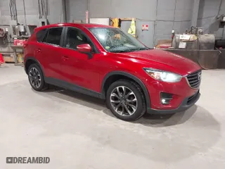2016 Mazda CX-5 Grand Touring with VIN JM3KE4DY6G0690923, listed as a IAAI auction lot 41875553 with 179,489 mi miles. Bid and sale history available at carsss.com. Image 1.