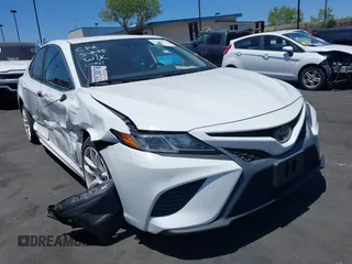 2019 Toyota Camry LE z VIN 4T1B11HK6KU754349, wystawiony jako IAAI lot #42262271 z przebiegiem 77 312 mil mil oraz . Historia ofert i sprzedaży dostępna na DreamBid. Obrazek 1.