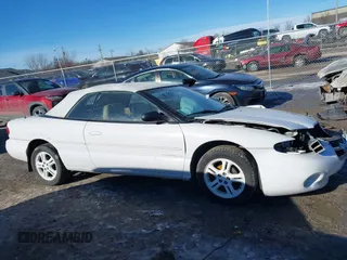 1996 Chrysler Sebring JXi with VIN 3C3EL55H6TT310724, listed as a IAAI auction lot 41424560 with Not Provided miles and . Bid and sale history available at DreamBid. Image 14.