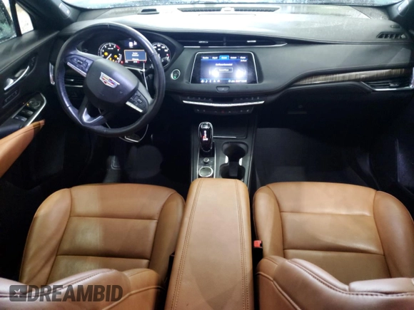 2020 Cadillac XT4 FWD Premium Luxury z VIN 1GYFZCR41LF143039, wystawiony jako Copart lot #57164005 z przebiegiem 24 218 mil mil oraz Nie do naprawy • Non repairable. Historia ofert i sprzedaży dostępna na DreamBid. Obrazek 8.