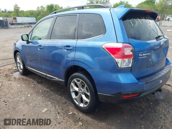2017 Subaru Forester Touring with VIN JF2SJAWC7HH455648, listed as a IAAI auction lot 42118358 with 58,123 mi miles and . Bid and sale history available at DreamBid. Image 3.