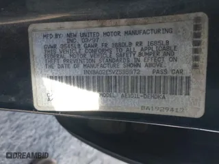 1997 Toyota Corolla with VIN 1NXBA02E5VZ595972, listed as a IAAI auction lot 41622050 with 143,577 mi miles. Bid and sale history available at carsss.com. Image 9.