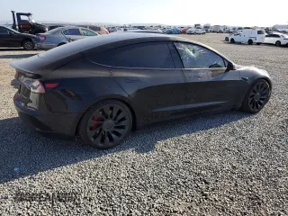 2023 Tesla Model 3 Performance z VIN 5YJ3E1EC9PF414218, wystawiony jako Copart lot #53105285 z przebiegiem 60 745 mil mil oraz Szkoda całkowita • Salvage title. Historia ofert i sprzedaży dostępna na DreamBid. Obrazek 3.
