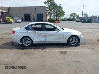2016 BMW 3 Series 320i with VIN WBA8A9C52GK617133, listed as a IAAI auction lot 42029140 with 59,113 mi miles. Bid and sale history available at carsss.com. Image 13.