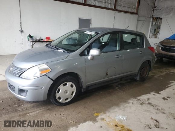 2009 Nissan Versa S with VIN 3N1BC13E59L499698, listed as a Copart auction lot 58242235 with 169,239 mi miles and Clean title. Bid and sale history available at DreamBid. Image 1.