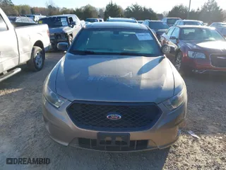 2015 Ford Sedan Police Interceptor with VIN 1FAHP2MK3FG135694, listed as a IAAI auction lot 41886352 with 128,478 mi miles. Bid and sale history available at carsss.com. Image 12.