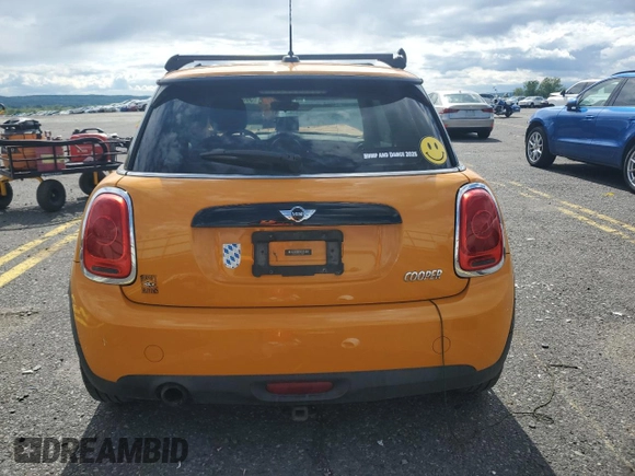 2016 MINI Hardtop with VIN WMWXP5C57G3B14701, listed as a Copart auction lot 58351545 with 111,647 mi miles and Salvage title. Bid and sale history available at DreamBid. Image 6.