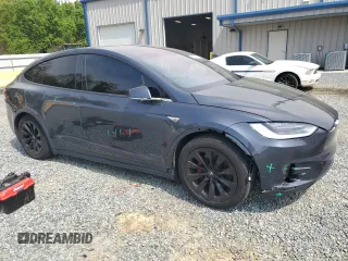 2016 Tesla Model X 70D z VIN 5YJXCBE23GF005295, wystawiony jako Copart lot #51034005 z przebiegiem 130 325 mil mil oraz Szkody całkowita. Historia ofert i sprzedaży dostępna na DreamBid. Obrazek 4.