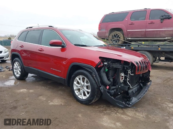 2014 Jeep Cherokee Latitude z VIN 1C4PJMCS4EW127709, wystawiony jako IAAI lot #42002110 z przebiegiem 51 574 mil mil oraz . Historia ofert i sprzedaży dostępna na DreamBid. Obrazek 1.