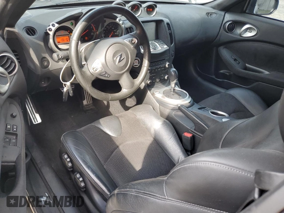 2009 Nissan 370Z z VIN JN1AZ44E69M405389, wystawiony jako Copart lot #43340975 z przebiegiem 31 521 mil mil oraz Szkoda całkowita • Salvage title. Historia ofert i sprzedaży dostępna na DreamBid. Obrazek 8.