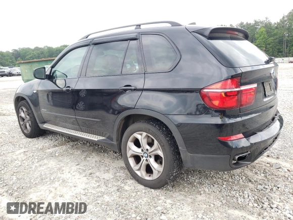 2011 BMW X5 50i with VIN 5UXZV8C52BL419028, listed as a Copart auction lot 59870505 with 126,666 mi miles and Salvage title. Bid and sale history available at DreamBid. Image 2.