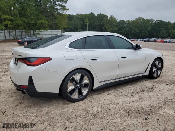 2023 BMW i4 eDrive35 with VIN WBY43AW00PFP81422, listed as a Copart auction lot 71289194 with 18,214 mi miles and Salvage Title. Bid and sale history available at carsss.com. Image 3.