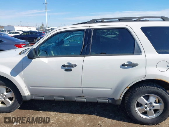 2011 Ford Escape XLT with VIN 1FMCU0D77BKB45161, listed as a IAAI auction lot 41890058 with 263,786 mi miles. Bid and sale history available at carsss.com. Image 15.