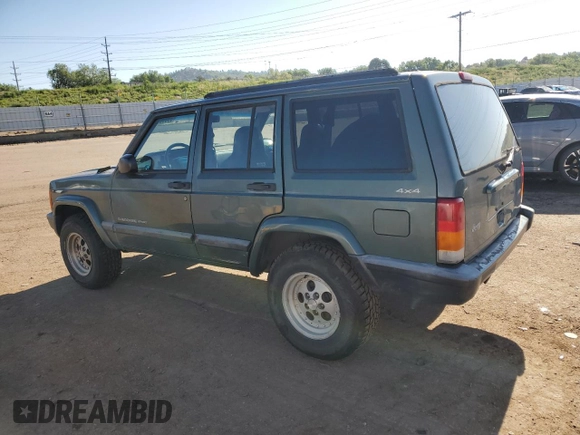 2000 Jeep Cherokee with VIN 1J4FF48S0YL198802, listed as a Copart auction lot 59996915 with 249,756 mi miles and Salvage title. Bid and sale history available at DreamBid. Image 2.