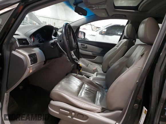 2011 Honda Odyssey Touring with VIN 5FNRL5H98BB027997, listed as a Copart auction lot 63239175 with 282,123 mi miles and Clean title. Bid and sale history available at DreamBid. Image 7.