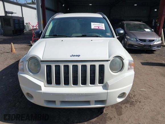 2008 Jeep Compass Sport with VIN 1J8FF47W98D584311, listed as a IAAI auction lot 41644836 with 213,271 mi miles and . Bid and sale history available at carsss.com. Image 12.
