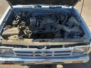 1992 Nissan Frontier SE z VIN 1N6HD16Y8NC358458, wystawiony jako Copart lot #62064905 z przebiegiem 226 678 mil mil oraz Czysty tytuł • Clean title. Historia ofert i sprzedaży dostępna na DreamBid. Obrazek 11.
