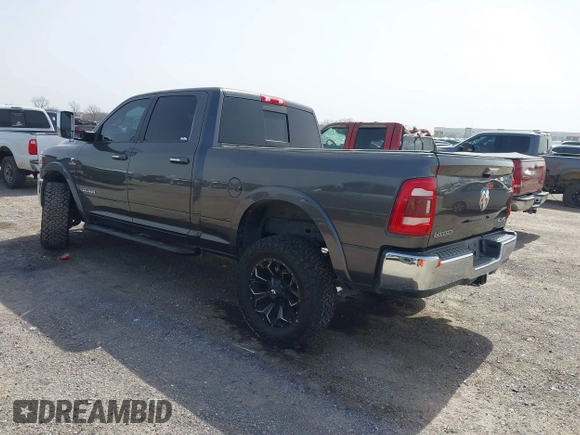 2019 Ram 2500 Laramie with VIN 3C6UR5FL2KG630341, listed as a IAAI auction lot 41742788 with 95,292 mi miles and . Bid and sale history available at DreamBid. Image 3.