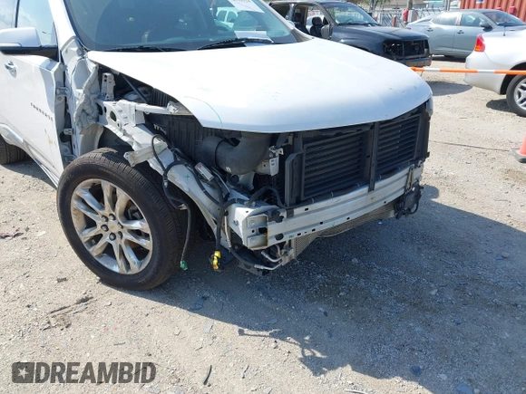 2018 Chevrolet Traverse High Country with VIN 1GNEVKKW9JJ111962, listed as a IAAI auction lot 42118324 with 104,311 mi miles and . Bid and sale history available at DreamBid. Image 6.