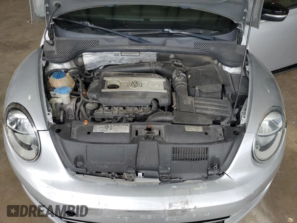 2012 Volkswagen Beetle with VIN 3VWV67AT1CM663839, listed as a Copart auction lot 55009455 with 122,042 mi miles and Salvage Title. Bid and sale history available at DreamBid. Image 11.