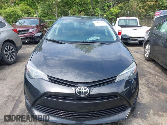 2018 Toyota Corolla L with VIN 2T1BURHE7JC018388, listed as a IAAI auction lot 42102862 with 111,882 mi miles and . Bid and sale history available at DreamBid. Image 12.