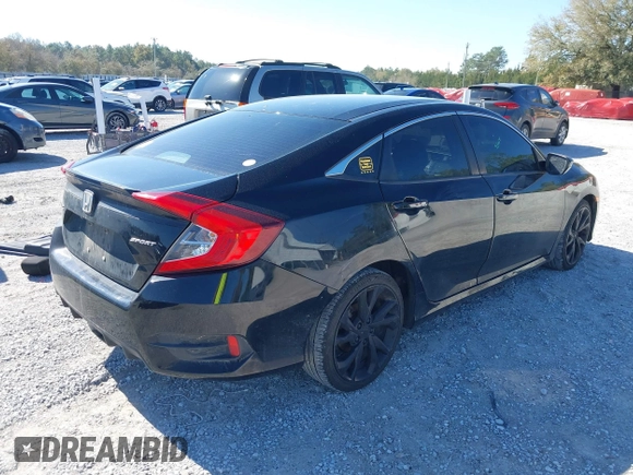 2019 Honda Civic Sedan Sport with VIN 2HGFC2F80KH519978, listed as a IAAI auction lot 41759437 with 118,138 mi miles. Bid and sale history available at carsss.com. Image 4.