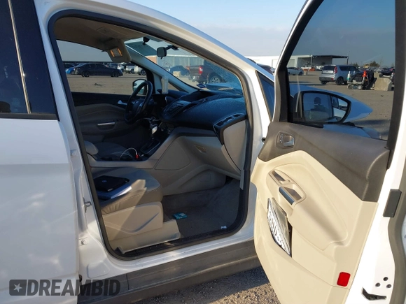 2013 Ford C-Max SE z VIN 1FADP5AU8DL556370, wystawiony jako IAAI lot #41276760 z przebiegiem 135 618 mil mil oraz . Historia ofert i sprzedaży dostępna na DreamBid. Obrazek 5.