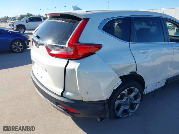 2018 Honda CR-V EX-L with VIN 5J6RW1H83JL001966, listed as a IAAI auction lot 41731738 with 72,237 mi miles. Bid and sale history available at carsss.com. Image 4.