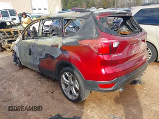 2019 Ford Escape Titanium z VIN 1FMCU9J99KUA72809, wystawiony jako IAAI lot #41588522 z przebiegiem Nie podano mil oraz . Historia ofert i sprzedaży dostępna na DreamBid. Obrazek 3.