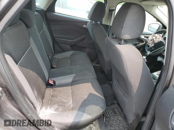 2014 Ford Focus SE z VIN 1FADP3K29EL187201, wystawiony jako Copart lot #59125805 z przebiegiem Nie podano mil oraz Szkoda całkowita • Salvage title. Historia ofert i sprzedaży dostępna na DreamBid. Obrazek 10.