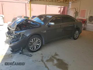 2018 Ford Taurus Limited z VIN 1FAHP2F87JG102207, wystawiony jako Copart lot #55647675 z przebiegiem 122 527 mil mil oraz Szkody całkowita. Historia ofert i sprzedaży dostępna na DreamBid. Obrazek 1.