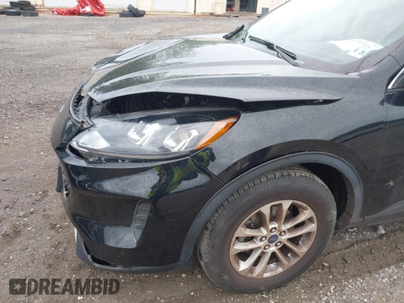 2021 Ford Escape SE with VIN 1FMCU9G67MUA23303, listed as a IAAI auction lot 42232319 with 12,694 mi miles and . Bid and sale history available at DreamBid. Image 18.