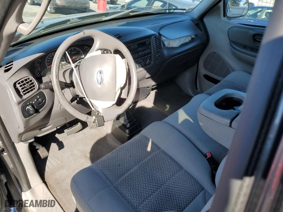 2004 Ford F-150 Heritage XL with VIN 2FTRX18W74CA39541, listed as a Copart auction lot 50390125 with 0 mi miles and Salvage Title. Bid and sale history available at carsss.com. Image 8.