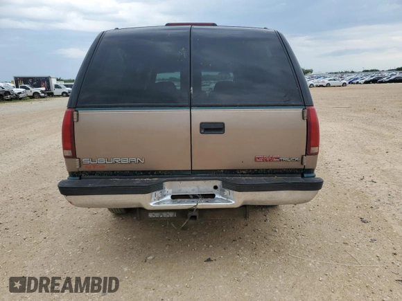 1995 GMC Suburban z VIN 1GKEC16K9SJ708907, wystawiony jako Copart lot #56415125 z przebiegiem 251 343 mil mil oraz Szkoda całkowita • Salvage title. Historia ofert i sprzedaży dostępna na DreamBid. Obrazek 6.