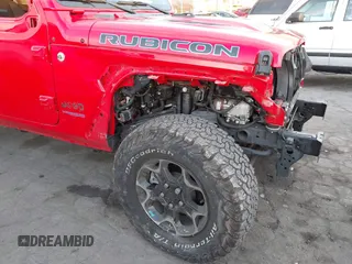 2022 Jeep Wrangler Unlimited Rubicon with VIN 1C4JJXR63NW206709, listed as a IAAI auction lot 41254820 with 25,317 mi miles and . Bid and sale history available at DreamBid. Image 18.