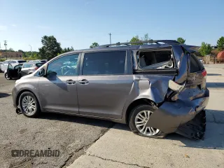 2012 Toyota Sienna XLE AAS with VIN 5TDYK3DC1CS279575, listed as a Copart auction lot 60350235 with 275,287 mi miles and Salvage title. Bid and sale history available at DreamBid. Image 2.