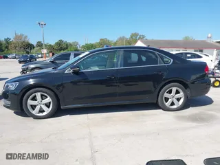 2012 Volkswagen Passat SE w/Sunroof with VIN 1VWBH7A38CC063186, listed as a IAAI auction lot 41700992 with 151,454 mi miles. Bid and sale history available at carsss.com. Image 14.