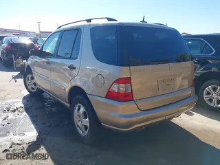 2003 Mercedes-Benz M-Class 3.7L with VIN 4JGAB57E33A414218, listed as a IAAI auction lot 41057534 with 132,342 mi miles. Bid and sale history available at carsss.com. Image 3.