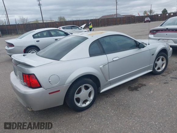 2000 Ford Mustang GT with VIN 1FAFP42X9YF173747, listed as a IAAI auction lot 41977220 with 169,097 mi miles. Bid and sale history available at carsss.com. Image 4.