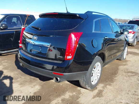 2014 Cadillac SRX with VIN 3GYFNAE32ES550136, listed as a IAAI auction lot 41219755 with 161,878 mi miles and . Bid and sale history available at DreamBid. Image 4.