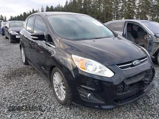 2016 Ford C-Max Energi SEL with VIN 1FADP5CU7GL106162, listed as a IAAI auction lot 41506915 with 126,046 mi miles. Bid and sale history available at carsss.com. Image 1.