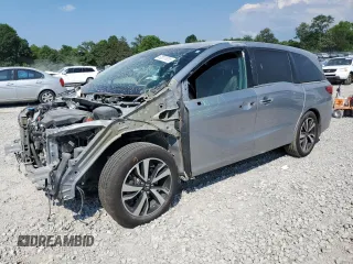 2018 Honda Odyssey Elite with VIN 5FNRL6H94JB010442, listed as a Copart auction lot 62077815 with 118,058 mi miles and Salvage title. Bid and sale history available at DreamBid. Image 1.