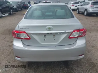 2013 Toyota Corolla L with VIN 5YFBU4EE8DP161765, listed as a IAAI auction lot 42109708 with 105,931 mi miles and . Bid and sale history available at DreamBid. Image 17.