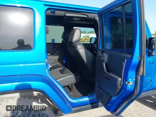 2016 Jeep Wrangler Unlimited 75th Anniversary with VIN 1C4BJWEG7GL179001, listed as a IAAI auction lot 42030735 with 123,681 mi miles. Bid and sale history available at carsss.com. Image 8.