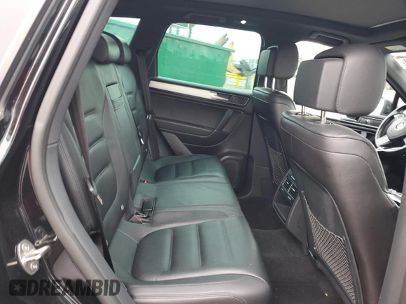 2017 Volkswagen Touareg Wolfsburg Edition with VIN WVGRF7BP9HD006520, listed as a Copart auction lot 84168634 with 76,596 mi miles and Salvage title. Bid and sale history available at DreamBid. Image 11.