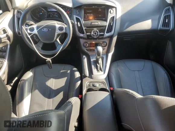2014 Ford Focus Titanium with VIN 1FADP3N24EL269008, listed as a Copart auction lot 56396975 with 116,856 mi miles and Salvage title. Bid and sale history available at DreamBid. Image 8.